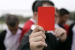Referee showing the red card